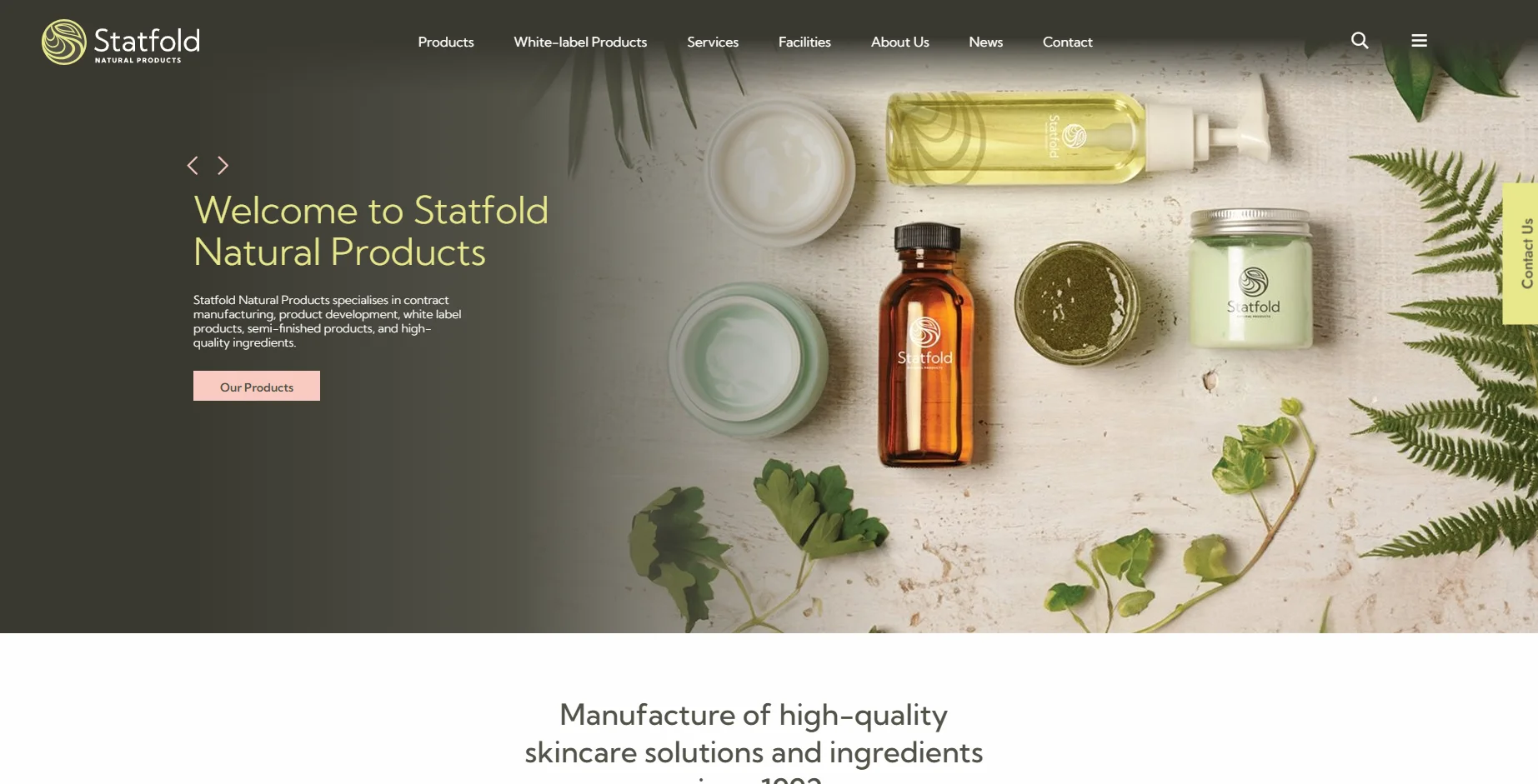 Homepage of Statfold Natural Products featuring a welcome message and natural skincare products arranged on a light surface with green foliage.